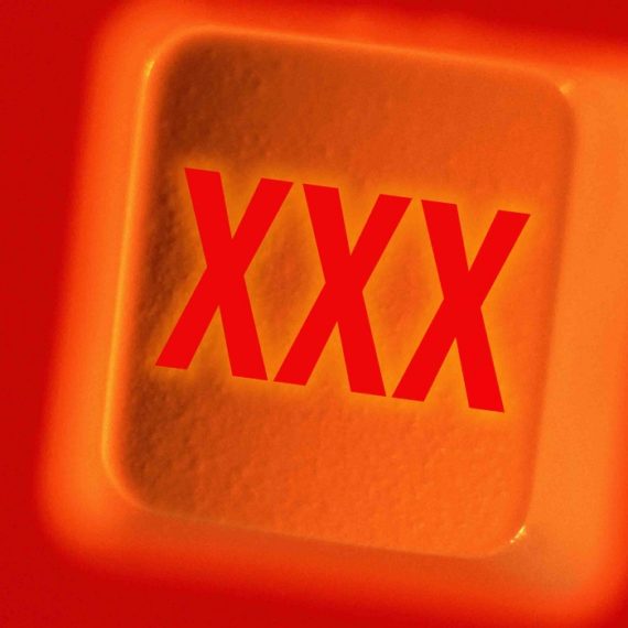 "XXX" on Computer Key --- Image by © Randall Fung/Corbis